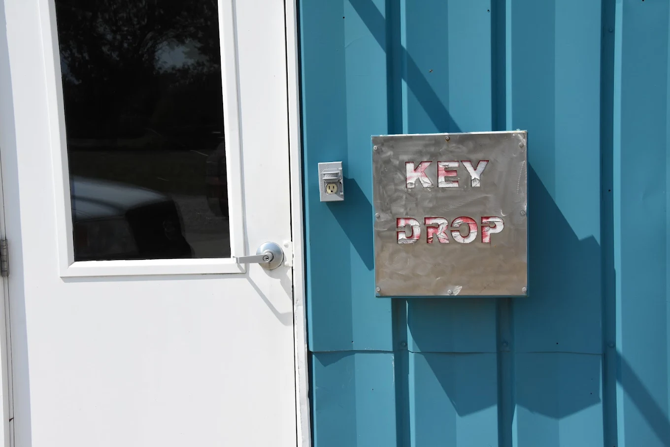 Key drop box at Gus Automotive Stuart Iowa
